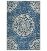 Blue vintage medallion rug with distressed detailing.